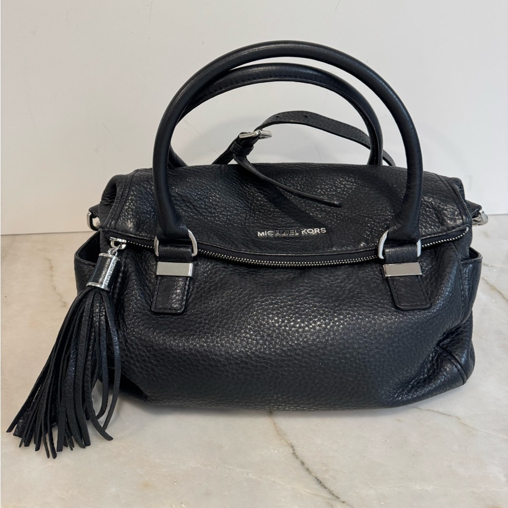 Black leather Michael kors tassel flap purse excellent condition